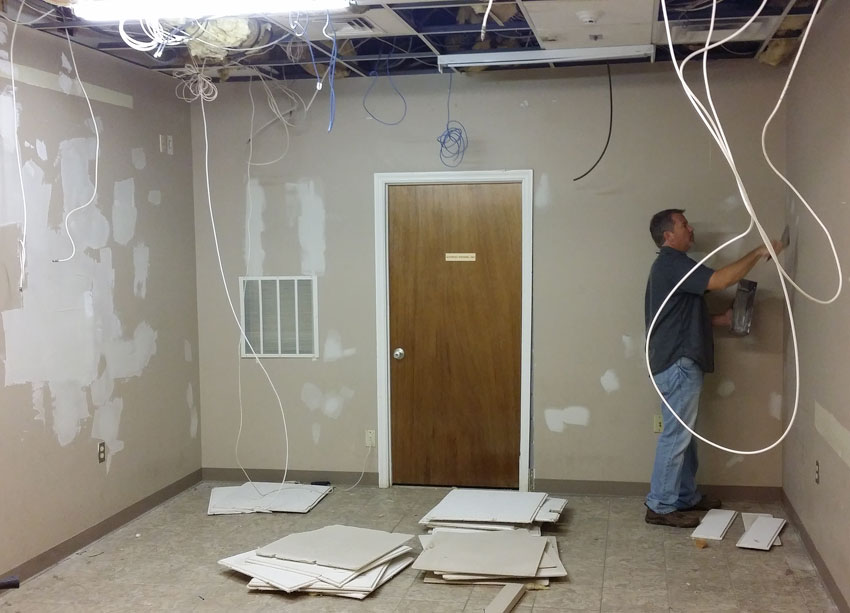 Repair and renovation of media room Mainstreet Property Services.
